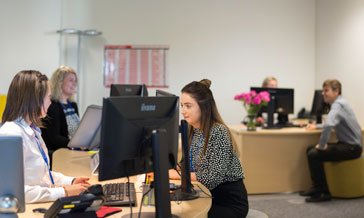 Queen Margaret University Staff working at their desks, Edinburgh