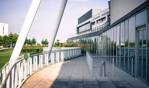 Glass panelled wall of Queen Margaret University Campus, taken from the patio area