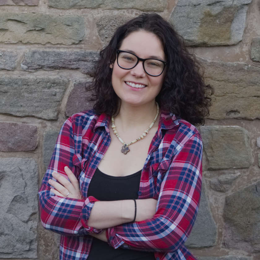 Portrait of Emma Bathgate smiling at the camera