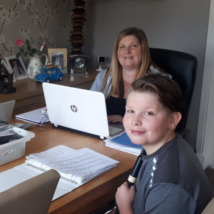 Lorain Findlay and her family sitting around a table working