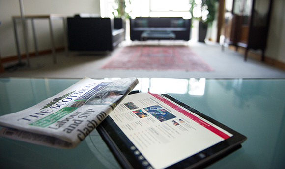 Newspapers on a table