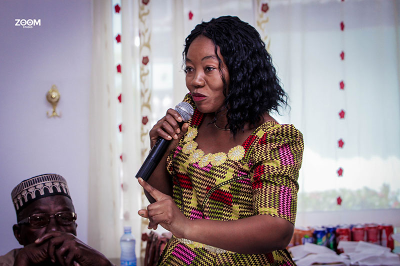 Local community teacher talking about mental health & diseases in local communities in Sierra Leone