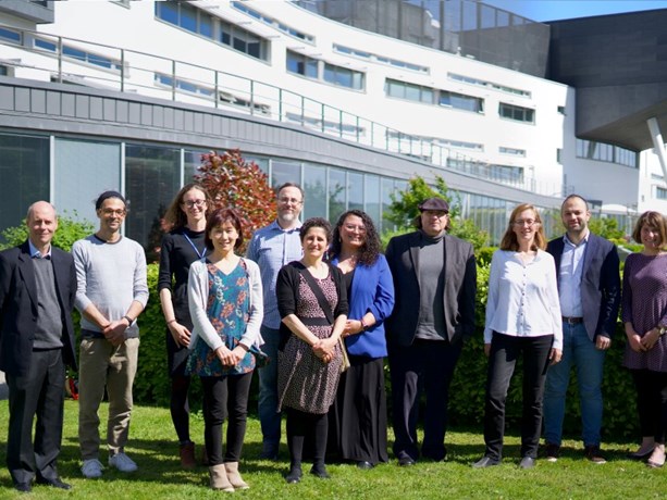 Staff group photo outside QMU 