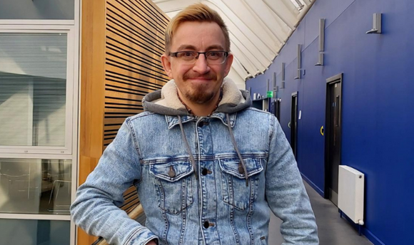 Nicholas Flynn on the third floor of the QMU campus