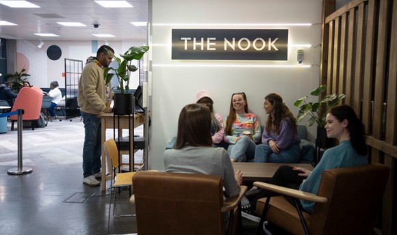 Students sitting and chatting in the Nook