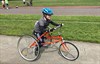 Child taking part in race running event