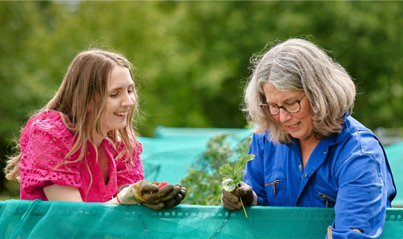 Two women gardening