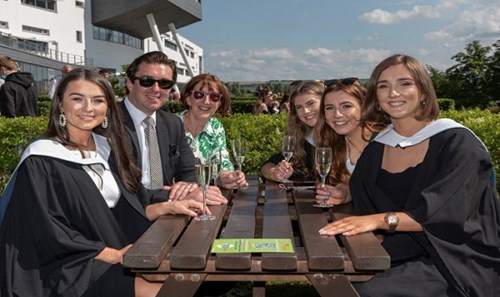 Students celebrating graduation