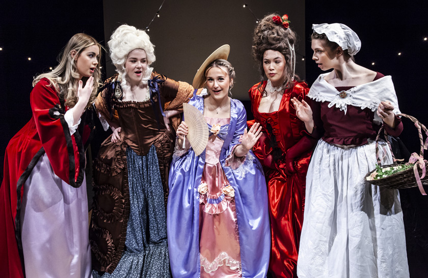 A group of students dressed in period clothing in the 2024 Costume Showcase.