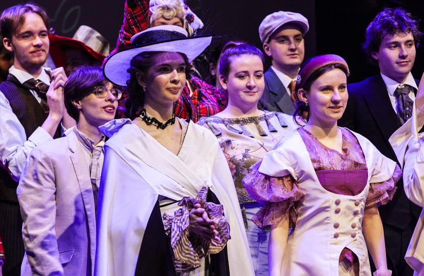 A group of students dressed in period clothing in the 2024 Costume Showcase.